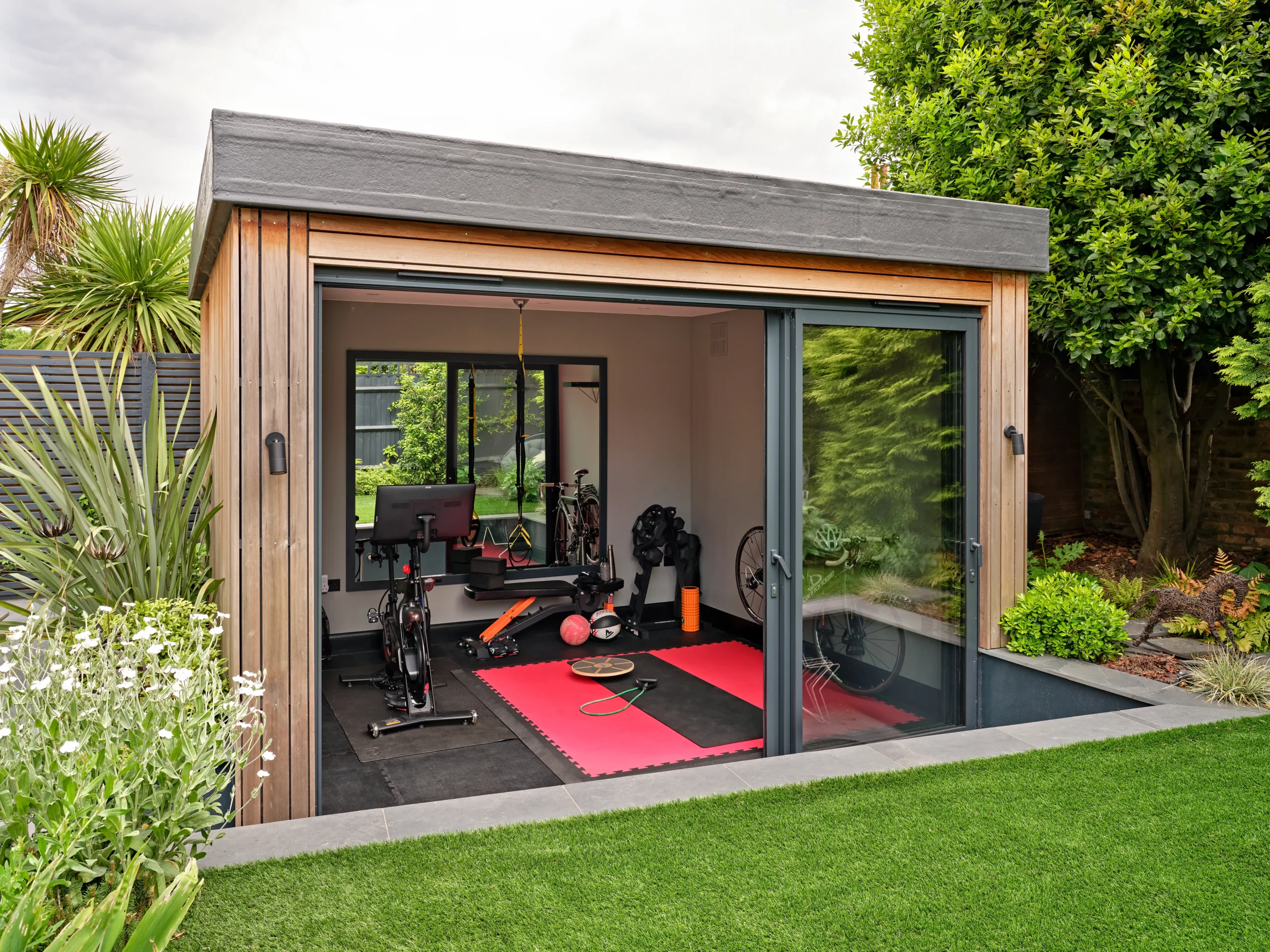 A master craftsperson working on a detailed wooden joinery.