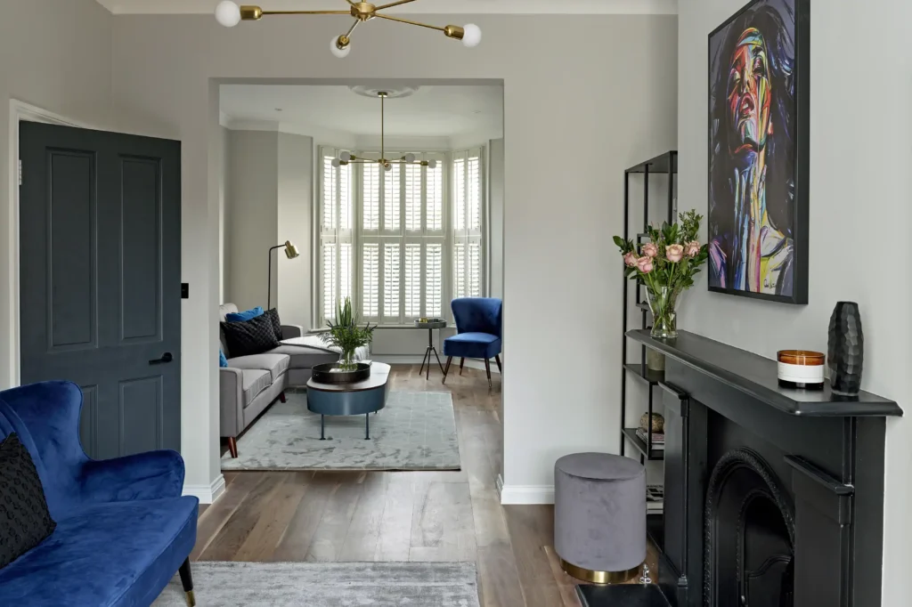 Crouch End renovation: interior detail with restored fireplace