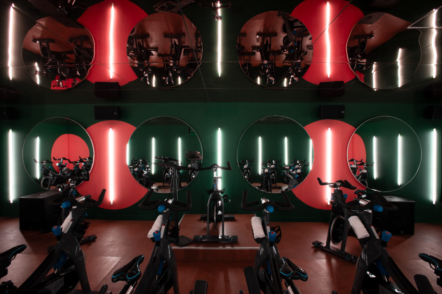 East of Eden ride studio with indoor cycling bikes and atmospheric lighting